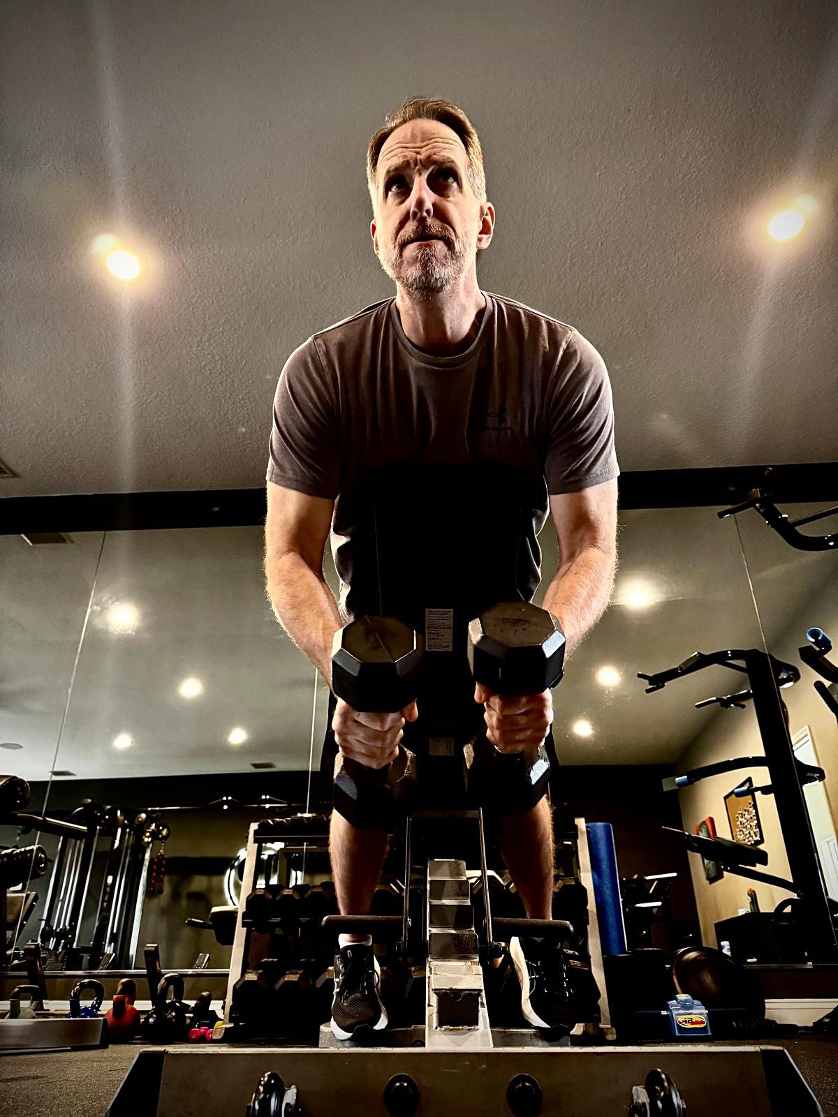 Man performing a dumbbell exercise
